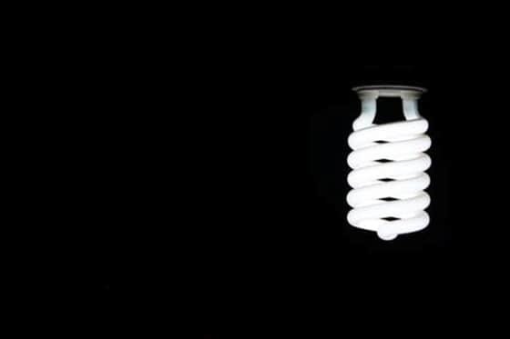 white led bulb in black background
